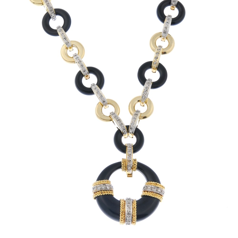 An onyx and diamond necklace. (1 of 3)