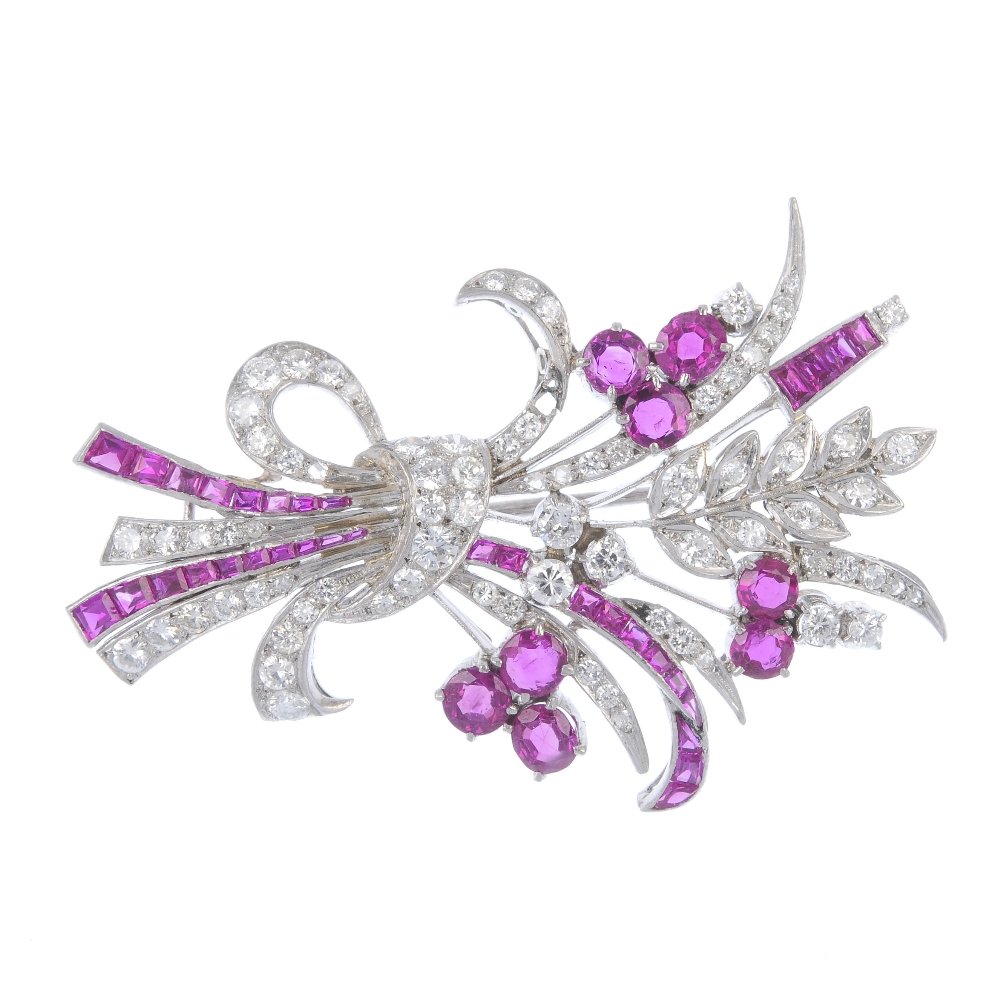 A ruby and diamond floral brooch. (1 of 2)