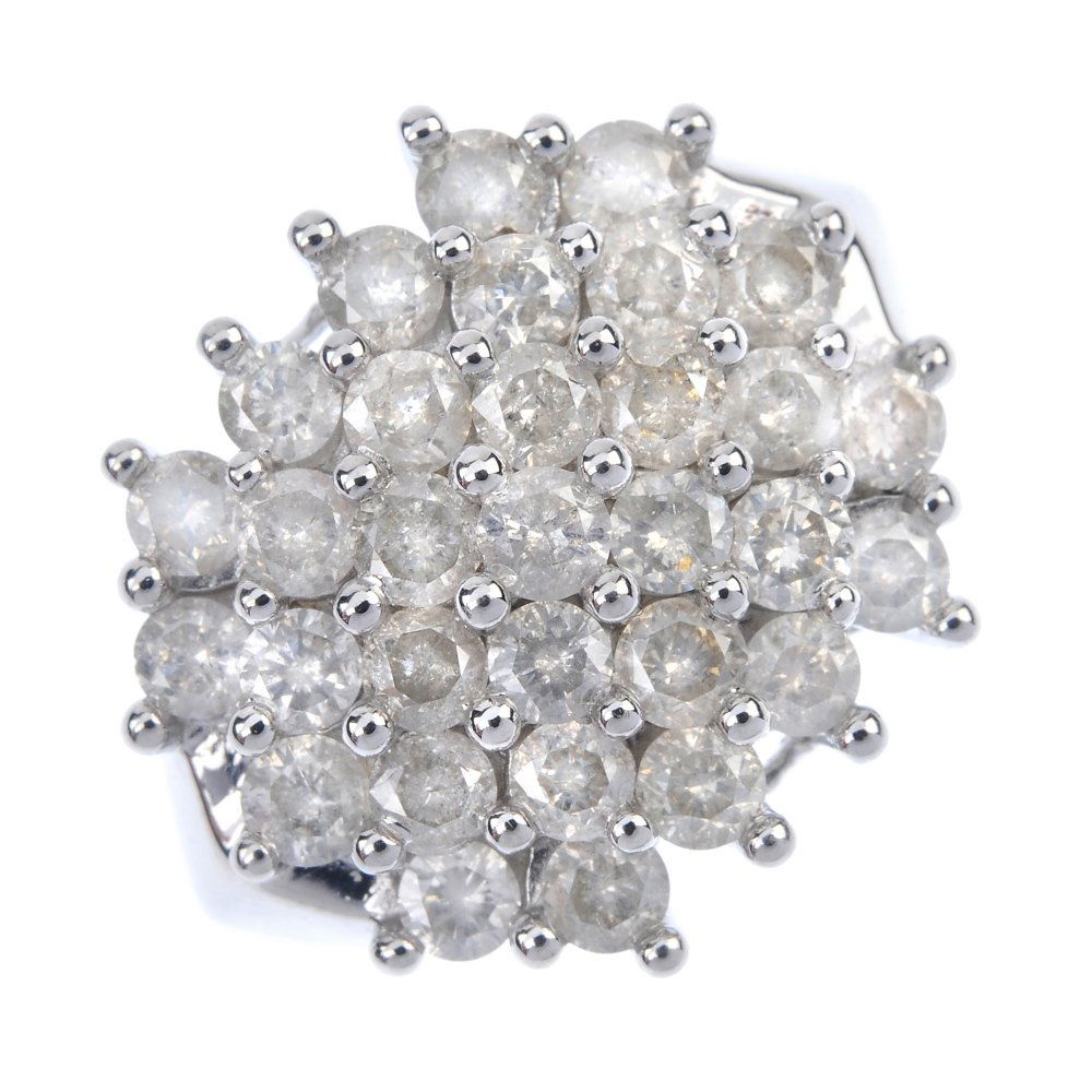 A 9ct gold diamond cluster ring. (1 of 4)
