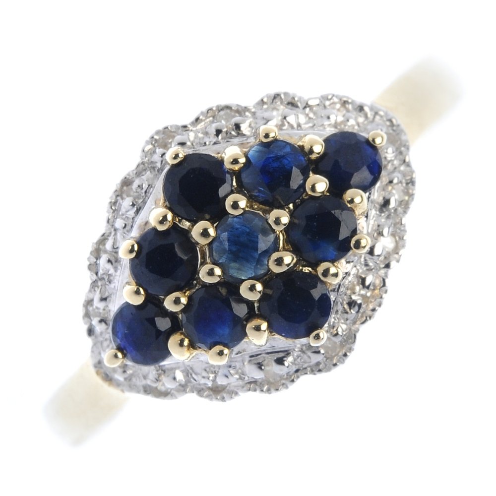 A 9ct gold sapphire and diamond dress ring. (1 of 4)