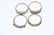 A selection of four 9ct gold diamond and gem-set rings. - 2