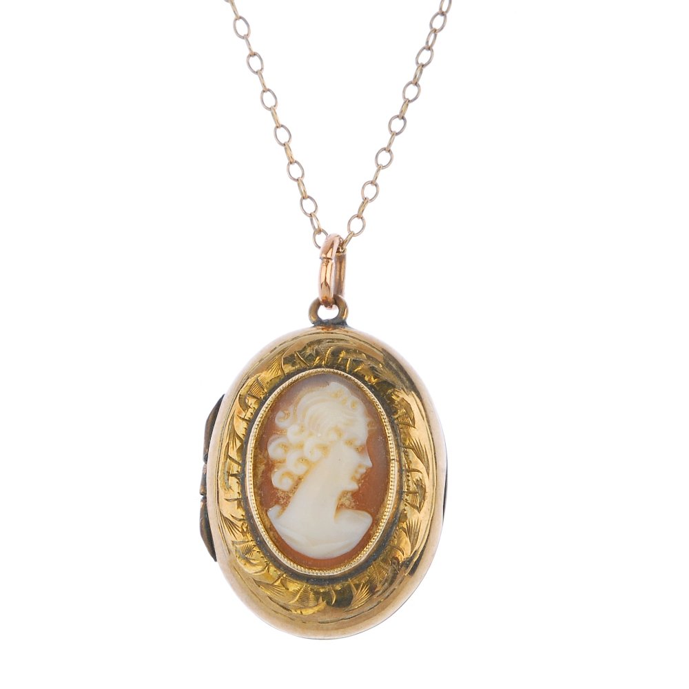 A shell cameo locket and ring. (1 of 4)