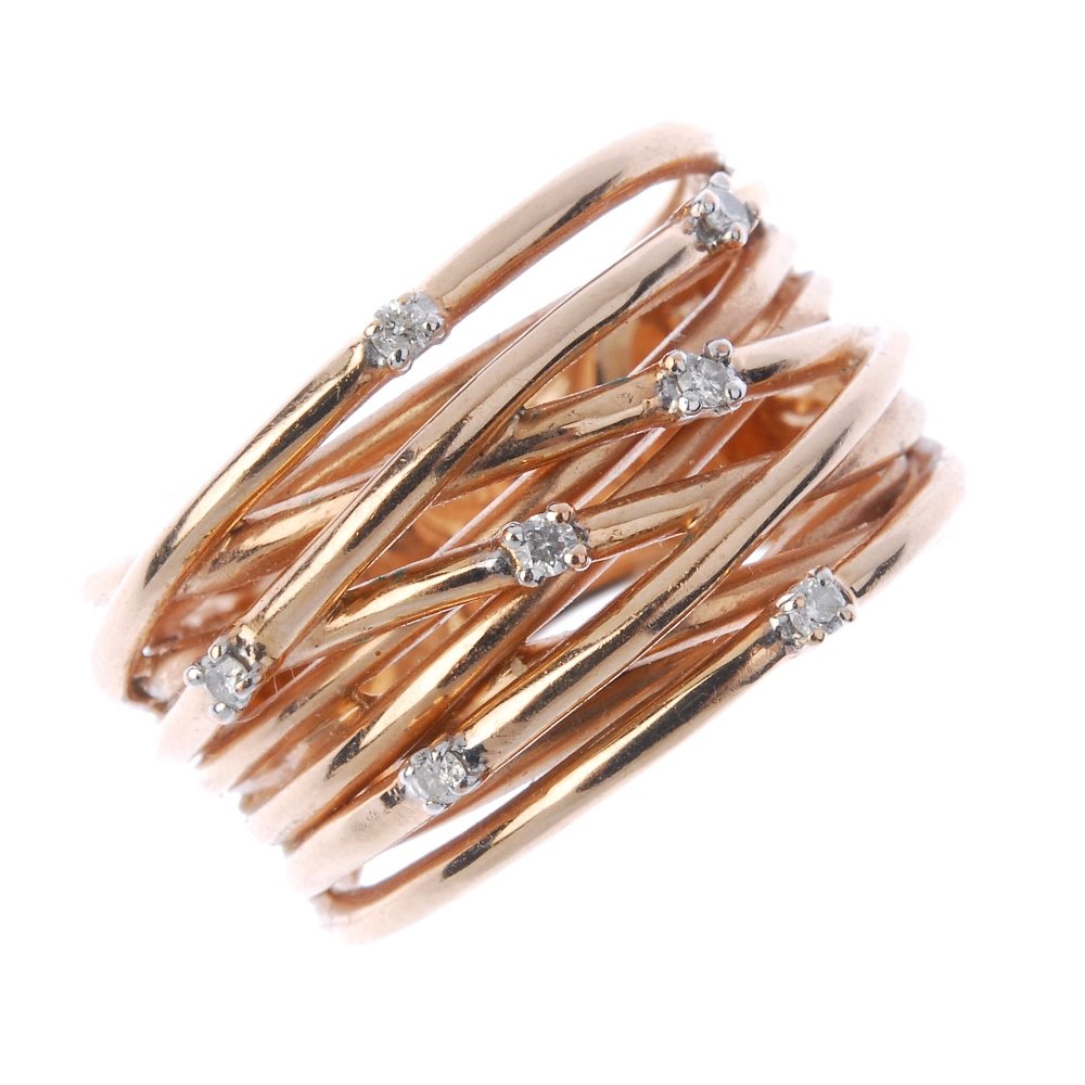 A 9ct gold diamond dress ring. (1 of 4)