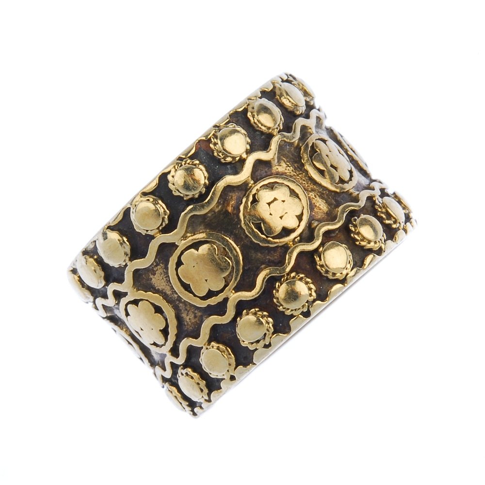 A mid 20th century gold band ring. (1 of 3)