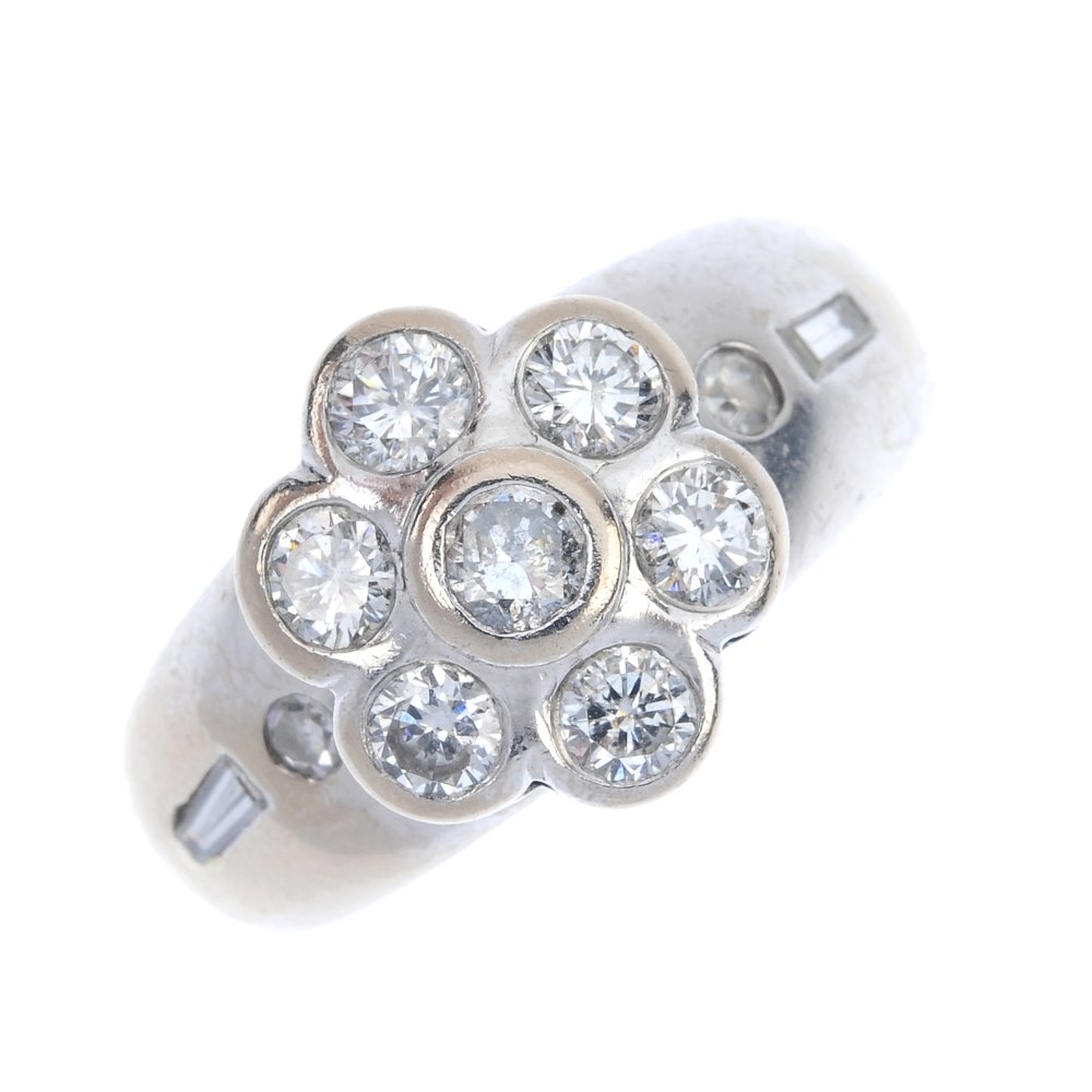An 18ct gold diamond floral cluster ring. (1 of 4)