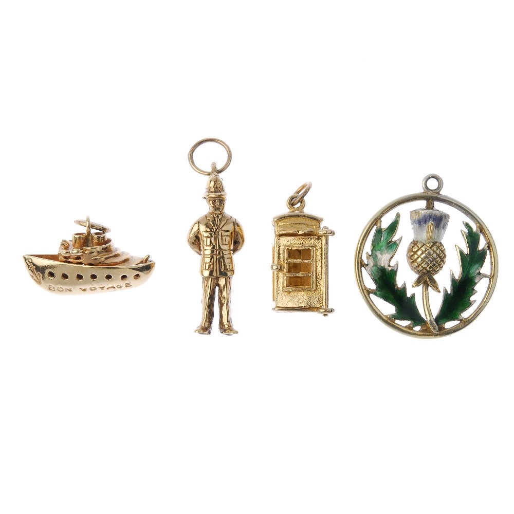 A pendant and three charms. (1 of 1)