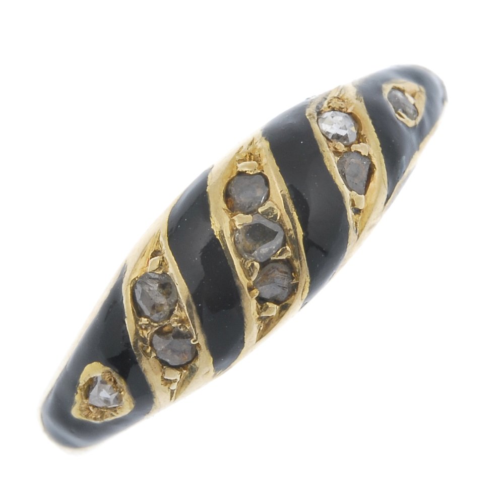 A late 19th century gold diamond and enamel ring. (1 of 4)