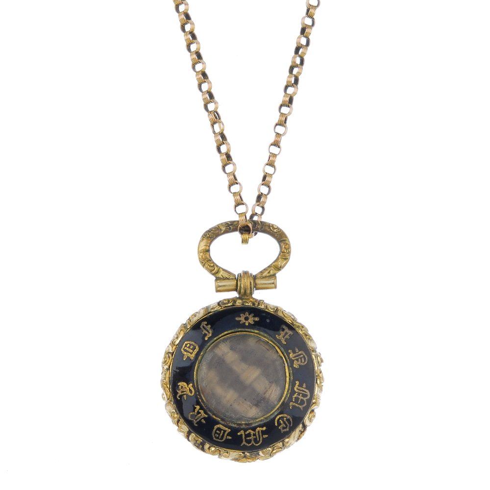 A late 19th century enamel memorial locket and 9ct gold (1 of 3)