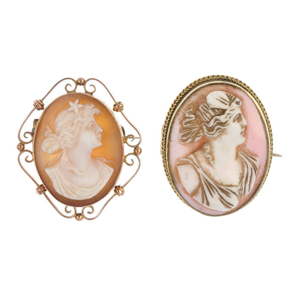 Two cameos.: Two cameos. The first of oval outline with rope-twist border to the carved pink shell portrait, together with another of similar subject, with scrolling border. Mark indicating gold. Lengths 3 to 3.2c