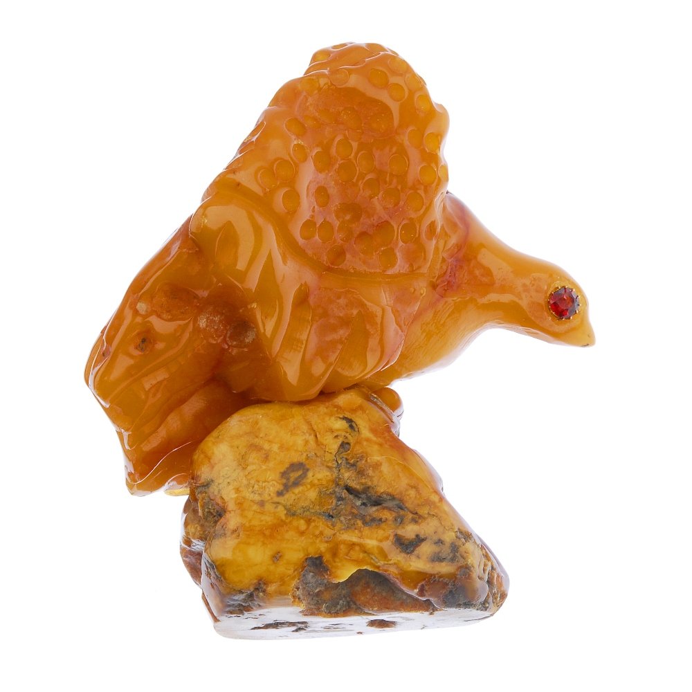 A natural amber eagle ornament. (1 of 2)
