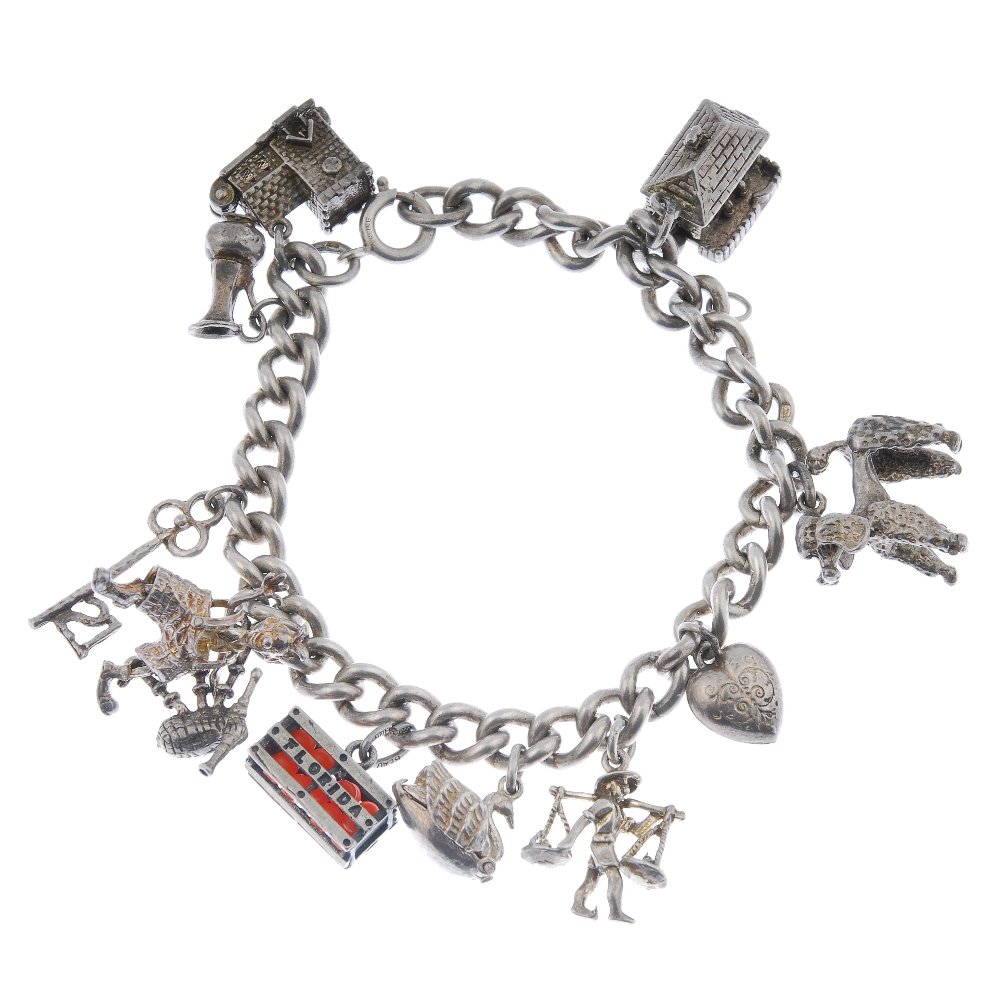 Three charm bracelets.: Three charm bracelets. The curb-link chains suspending a total of thirty-seven charms to include a beer keg and a policeman's helmet. Lengths 17.5 to 20cms. Weight 159.3gms.