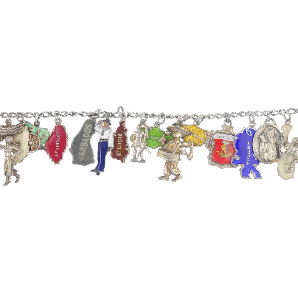 Five charm bracelets.: Five charm bracelets. To include four with curb-link chains and one with a double curb-link chain, suspending a total of seventy-nine chains, to include a gravy boat, a dog sat in a basket and a bell.