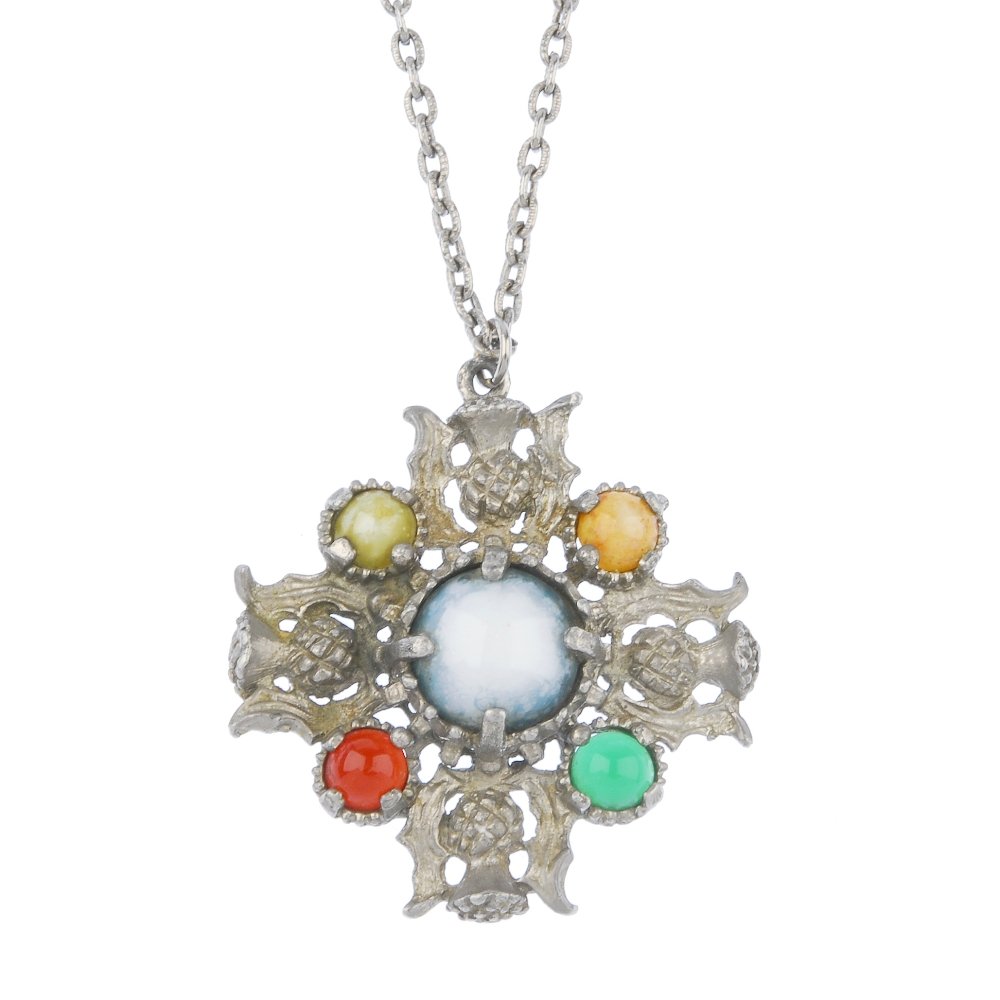 A selection of designer costume jewellery.: A selection of designer costume jewellery. To include a pair of Trifari knot ear studs, a Monet bangle and Napier ear clips.