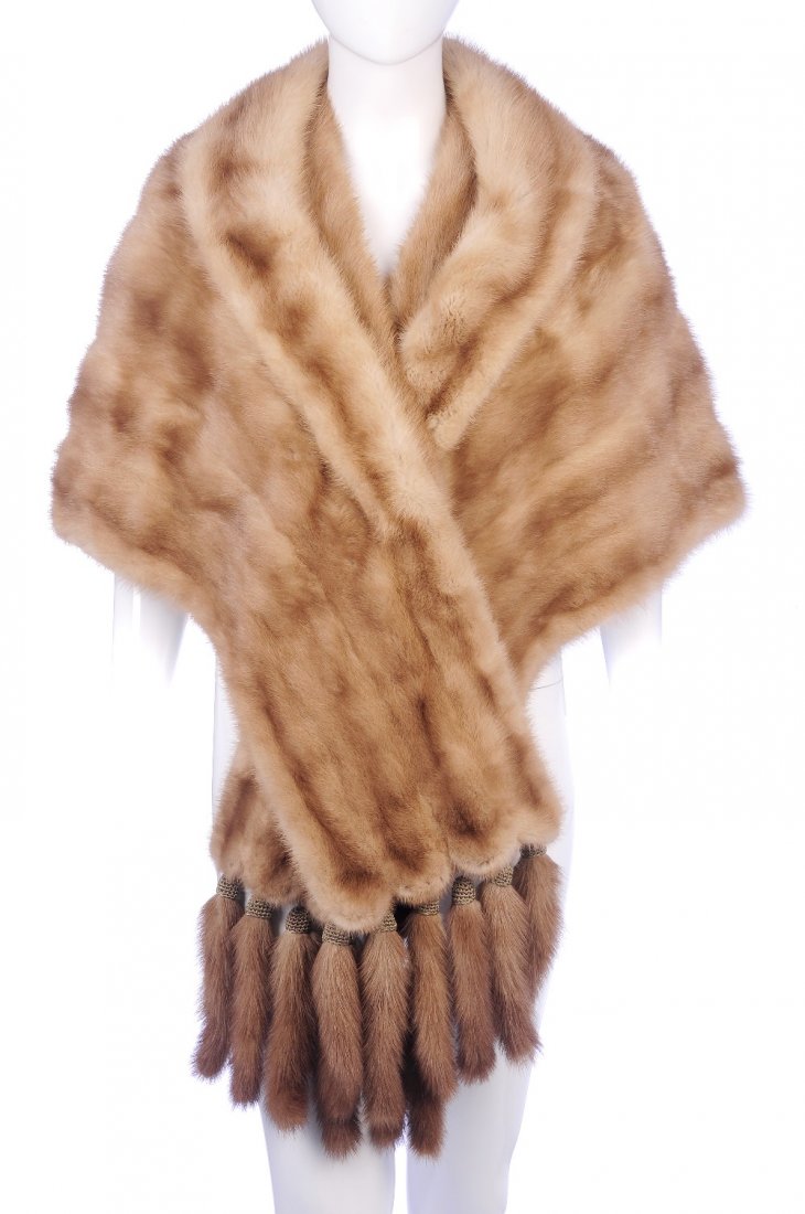 A dawn pastel mink cape-stole with detachable tails.: A dawn pastel mink cape-stole with detachable tails. Featuring a lapel collar, a single hook and eye fastening, long front panels with scalloped detail and six detachable tails at either end, a single