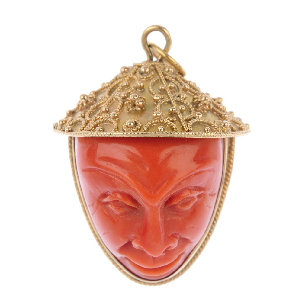 A mid 20th century coral pendant. (1 of 3)
