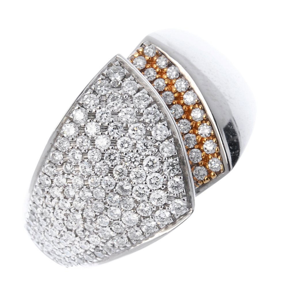 CHIMENTO - an 18ct gold 'Desiderio' diamond ring.: CHIMENTO - an 18ct gold 'Desiderio' diamond ring. Of asymmetric design, the tapered stepped band, pave-set with brilliant-cut diamonds. Signed Chimento. Estimated total diamond weight 1ct. Hallmarks f