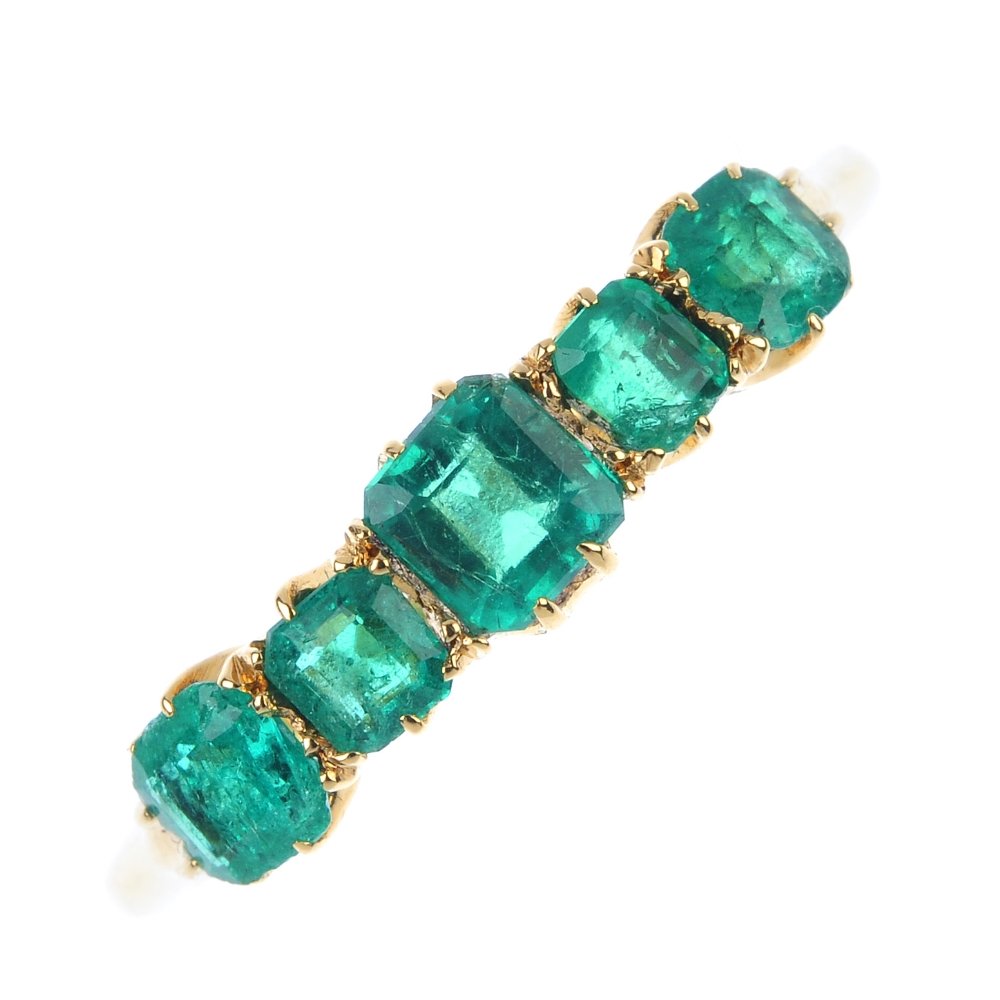 An emerald five-stone ring. (1 of 4)