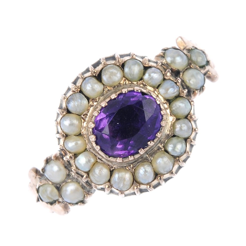 An amethyst and split pearl ring. (1 of 4)
