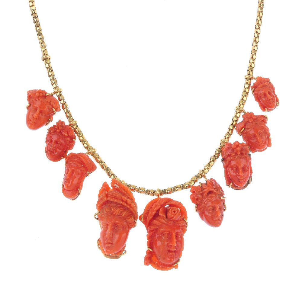 A carved coral necklace. (1 of 3)