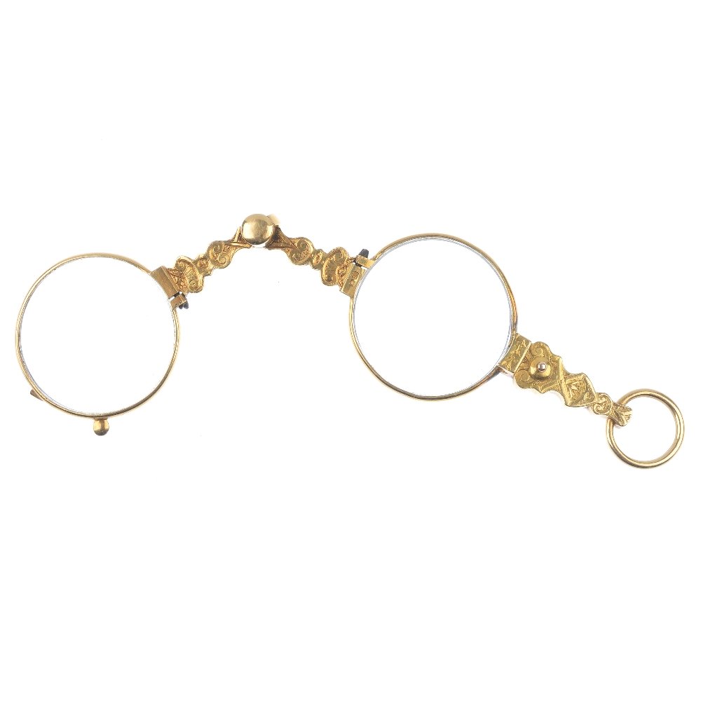 A pair of mid 20th century 18ct gold lorgnettes. (1 of 2)