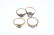 A selection of four diamond and gem-set dress rings. - 2
