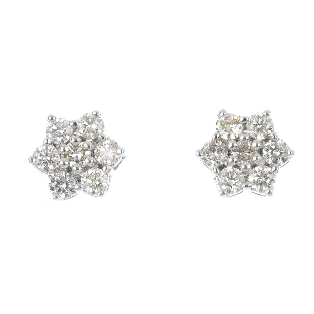A pair of diamond cluster ear studs. (1 of 2)