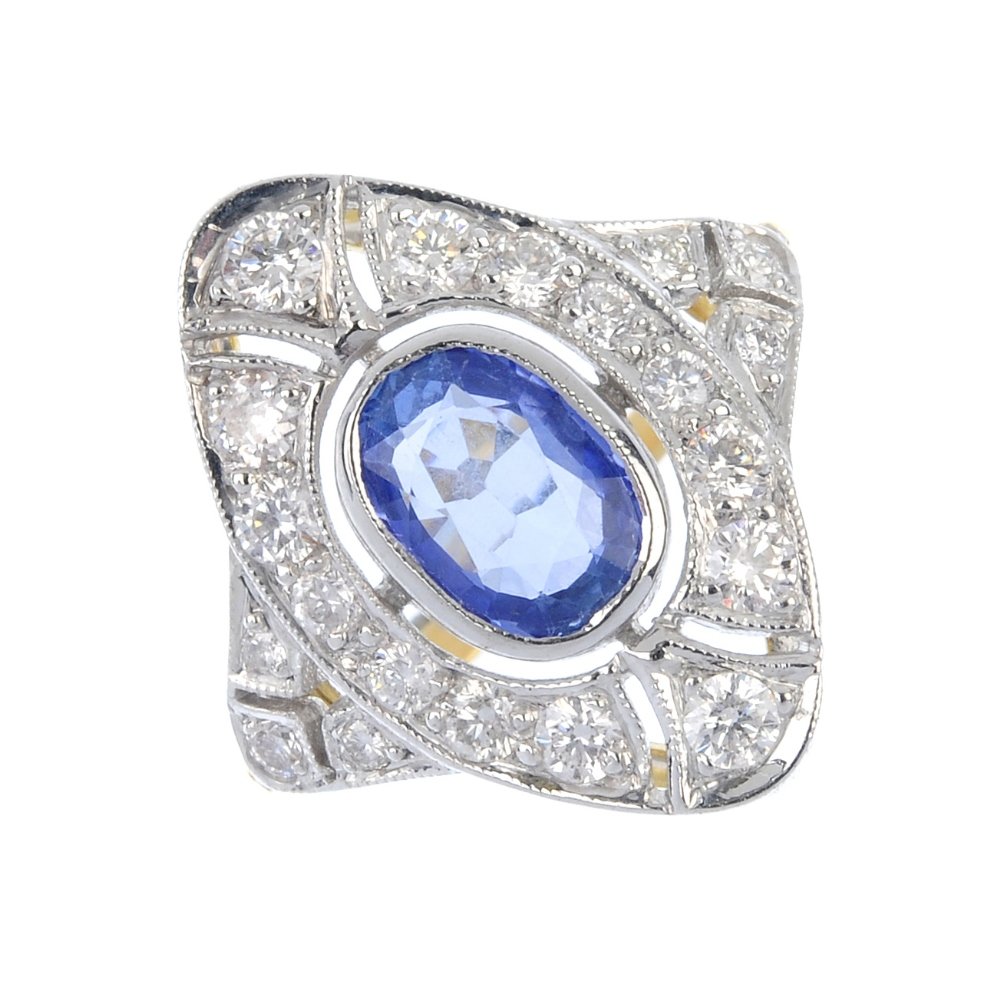 A sapphire and diamond cluster ring. (1 of 5)