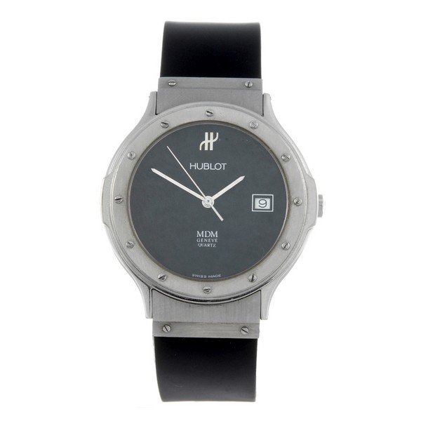 HUBLOT - a gentleman's stainless steel MDM wrist watch.: HUBLOT - a gentleman's MDM wrist watch. Stainless steel case. Numbered 101655. Unsigned quartz movement with quick date set. Black dial, date aperture to three. Fitted to a signed black rubber strap w