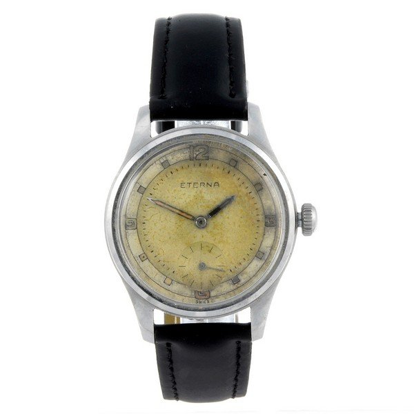 ETERNA - a gentleman's stainless steel wrist watch.: ETERNA - a gentleman's wrist watch. Stainless steel case. Numbered 3214622. Signed manual wind movement, numbered 3239071. Discoloured dial with cube hour markers, quarterly Arabic numerals, subsidiar