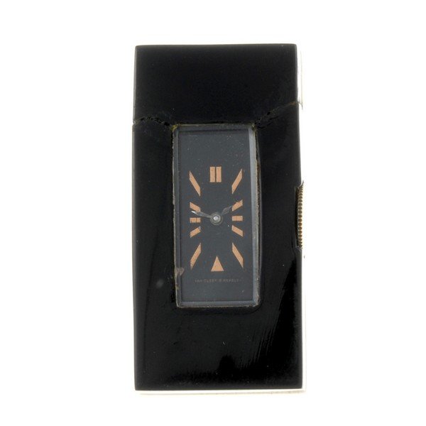 An onyx domino clock by Van Cleef & Arpels. (1 of 4)
