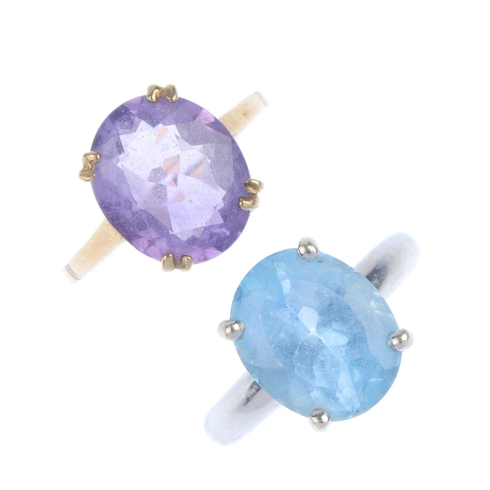 A selection of three 9ct gold gem-set rings.: A selection of three 9ct gold gem-set rings. To include a blue topaz single-stone ring, an amethyst single-stone ring and an oval moss agate cabochon ring. Hallmarks for 9ct gold. Weight 10.7gms.