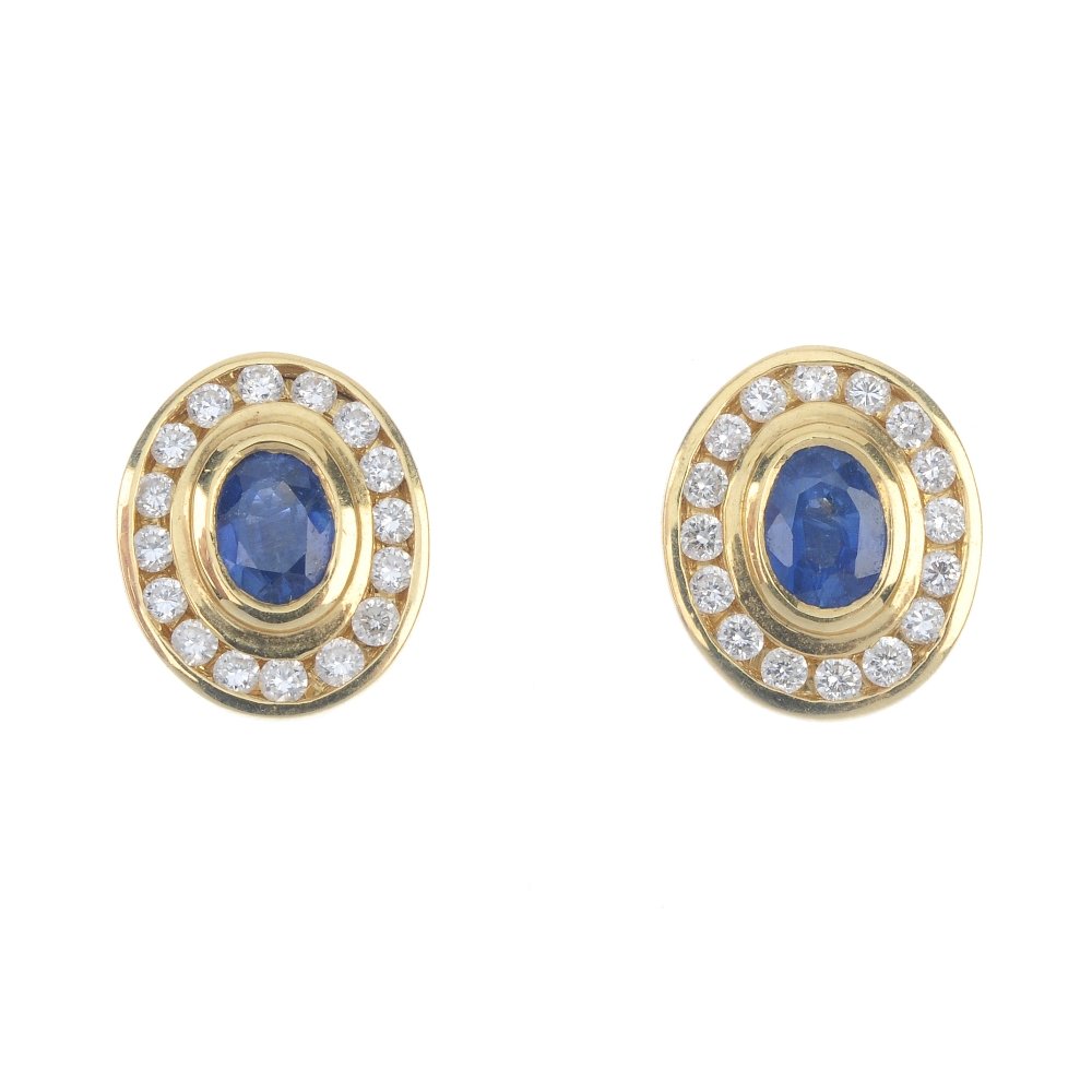 A pair of sapphire and diamond ear studs. (1 of 2)