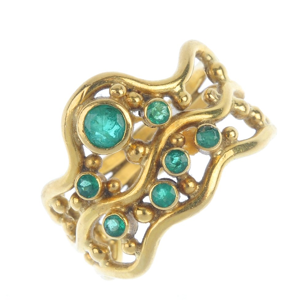 A 1970s 18ct gold emerald dress ring. (1 of 3)