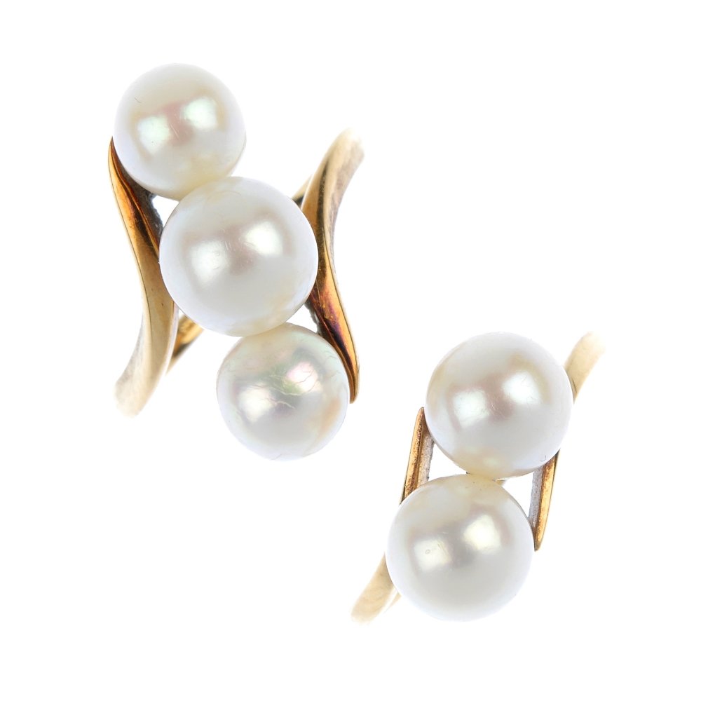 MIKIMOTO - two cultured pearl dress rings. (1 of 3)