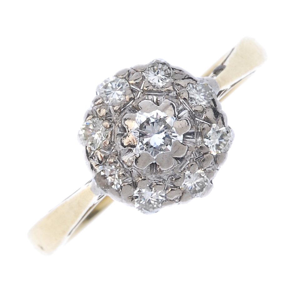 A mid 20th century 18ct gold diamond cluster ring. (1 of 3)
