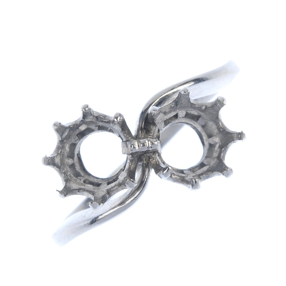 An early 20th century platinum two-stone crossover ring (1 of 3)