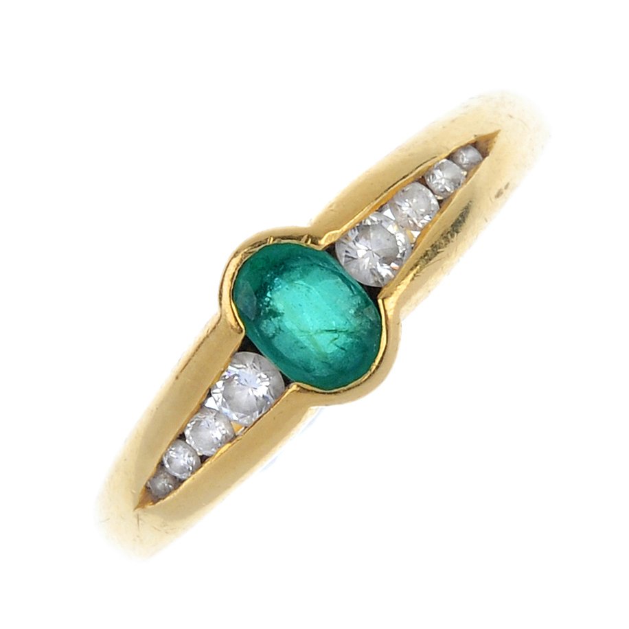 An 18ct emerald and diamond ring. (1 of 4)