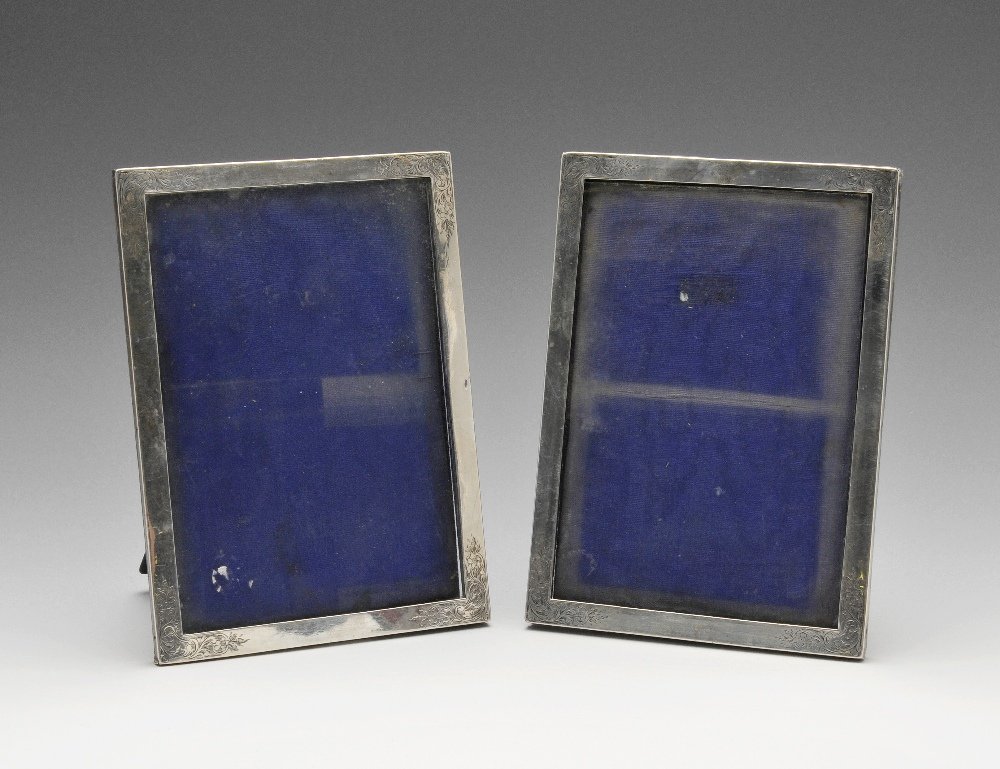 A pair of Edwardian silver mounted photograph frames. (1 of 5)