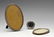Two silver mounted oval frames & a small circular