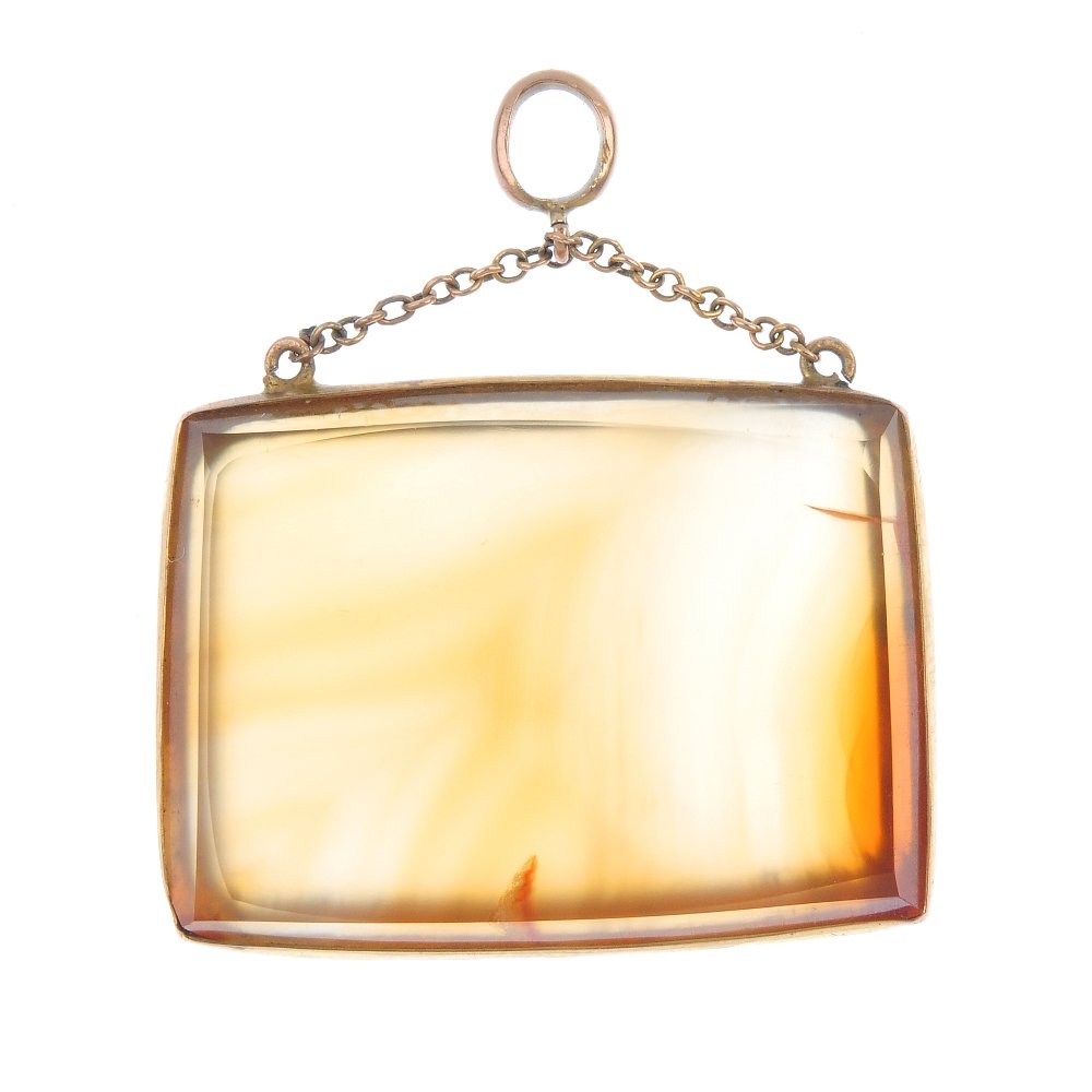An early 20th century 9ct gold mounted agate pendant. (1 of 2)