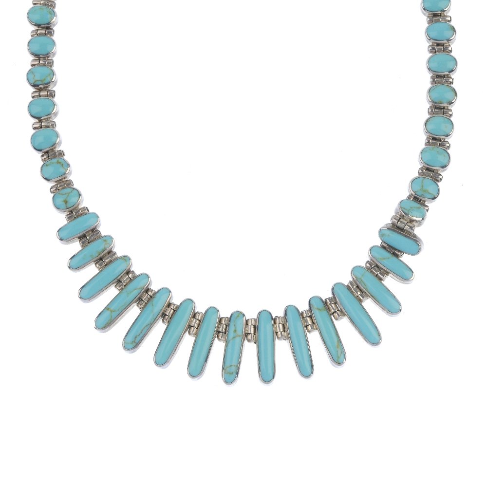 Four items of silver and white metal gem set jewellery. (1 of 2)