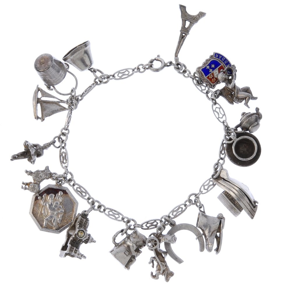 Three charm bracelets.: Three charm bracelets. The two fancy-link bracelets and one curb-link chain suspending a total of forty-eight charms, including an Eiffel tower and a swan charm. Lengths 16 to 18cms. Weight 112.6gms.