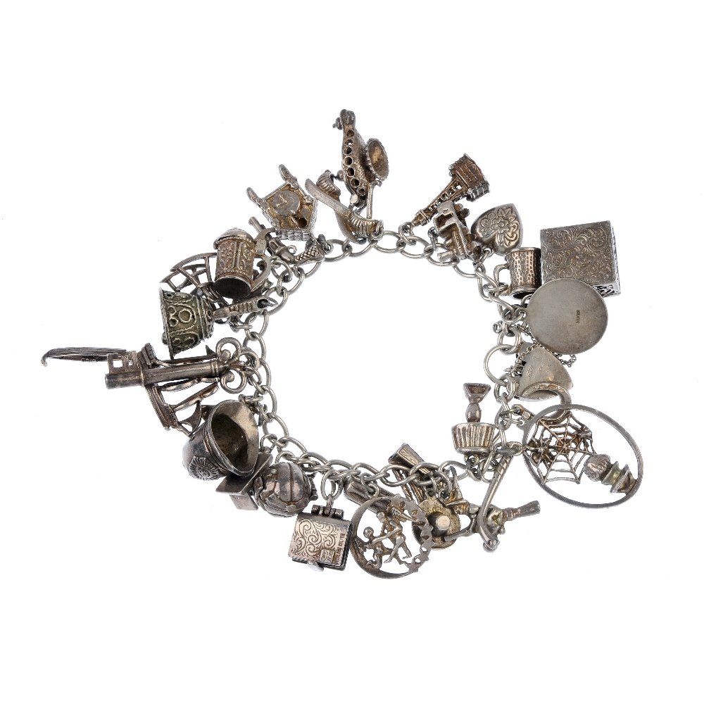 Two charm bracelets and four loose charms.: Two charm bracelets and four loose charms. Each a curb-link bracelet suspending a total of forty-two charms, to include a horseshoe, a penny-farthing and a spiders web, together with four loose charms