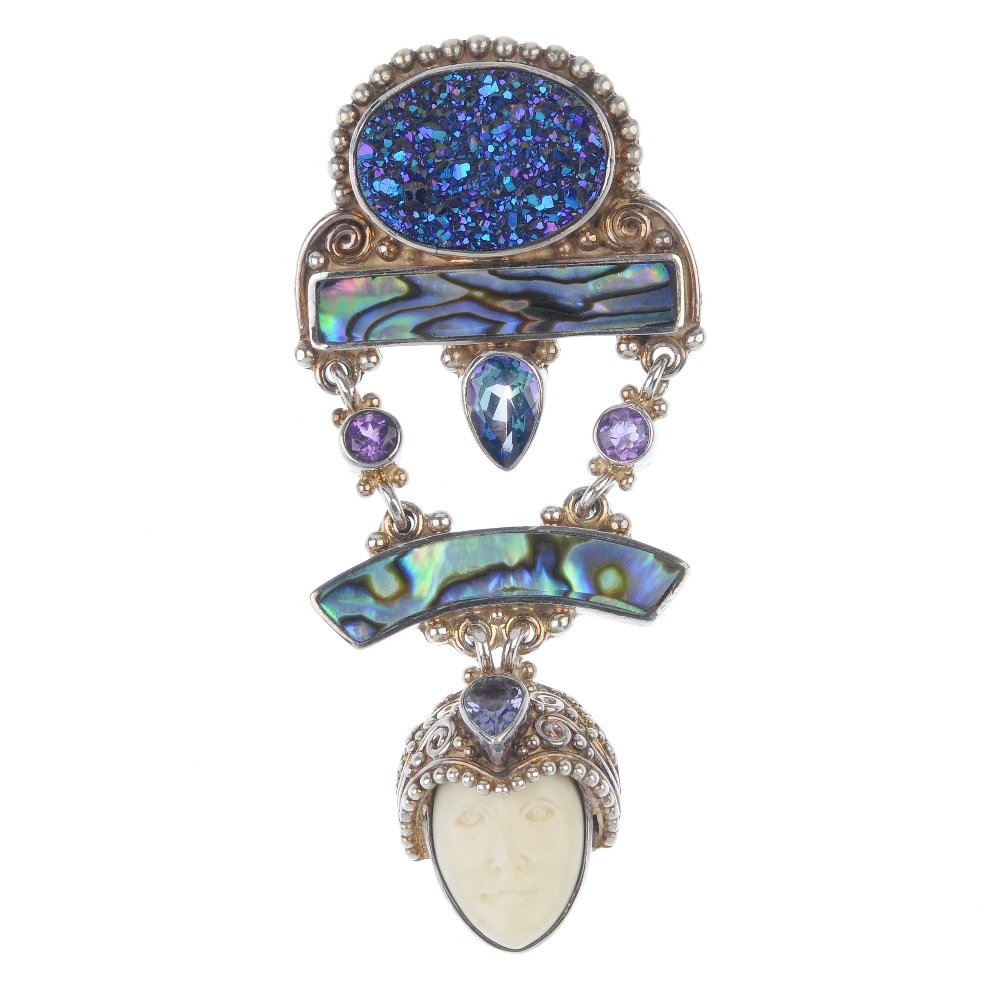 A selection of silver and white metal jewellery.: A selection of silver and white metal jewellery. To include two charm bracelets suspending a total of thirty-three charms, together with a silver buckle. Hallmarks for London, 1900. Weight 282.5gms.