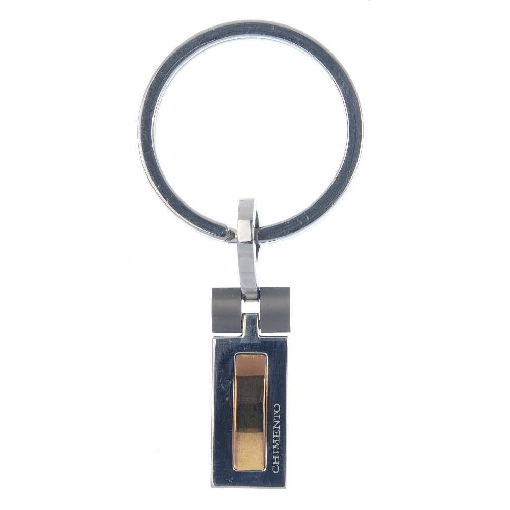CHIMENTO - a key ring.: CHIMENTO - a key ring. The ring suspending a three-tone metal tag with engraved logo. Signed Chimento. Length 6cms.