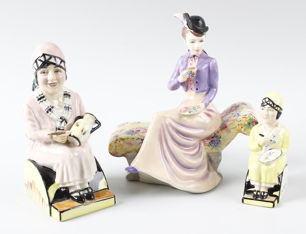 Two Kevin Francis figures, together with Royal Winton: Two Kevin Francis figures, 'Little Clarice' limited edition 665/2500, and 'Mini Clarice Cliff'. Together with a Royal Winton figure and plate. (4).