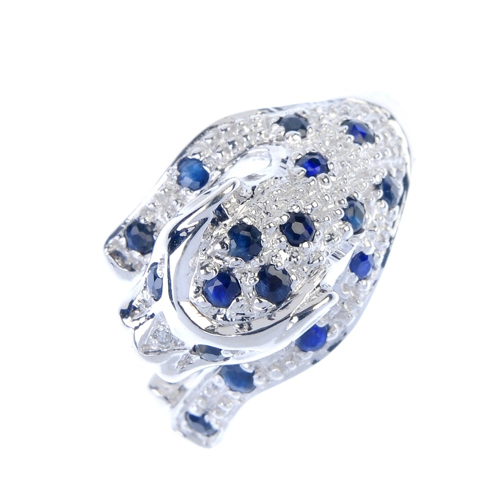 A 9ct gold sapphire and diamond leopard ring. (1 of 3)