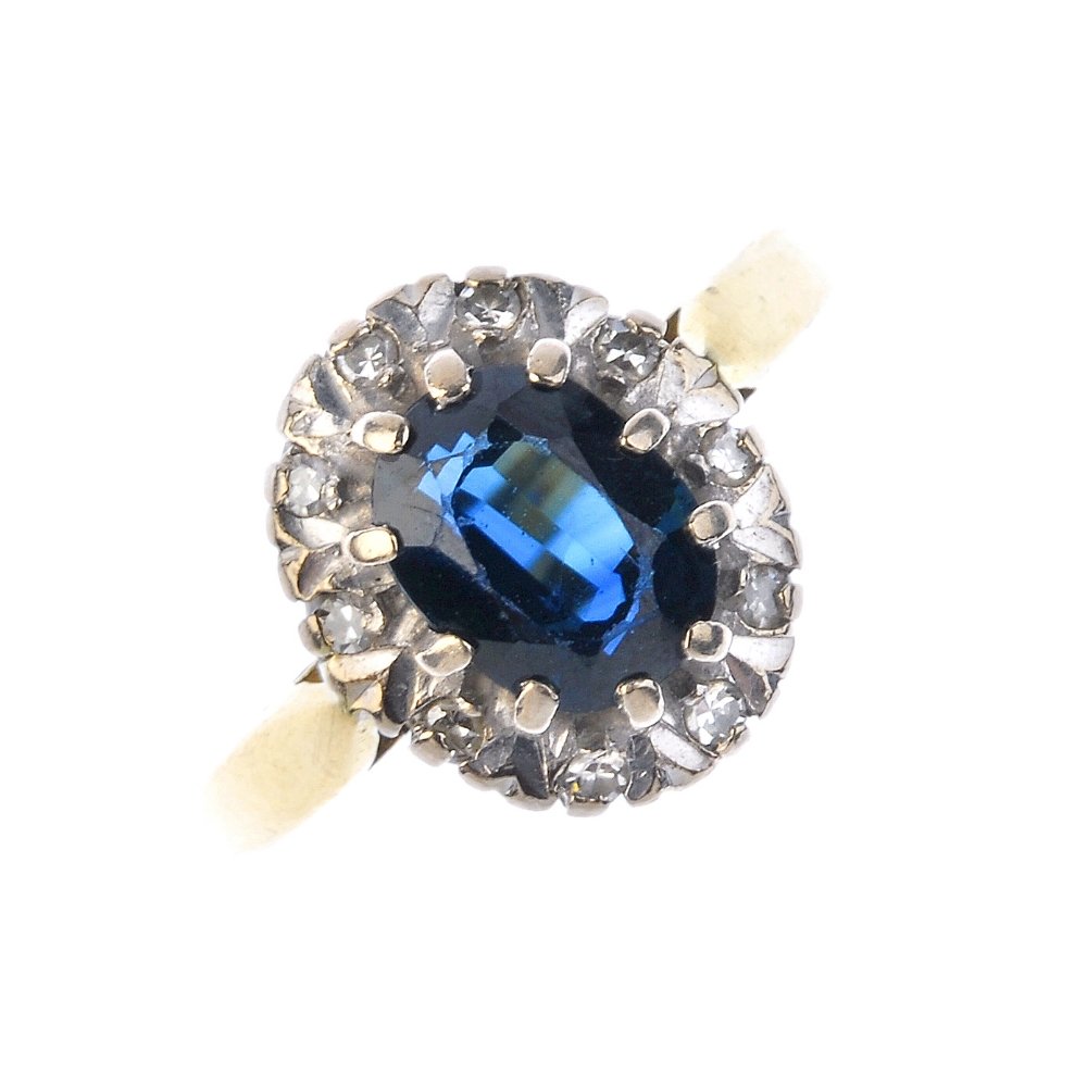 A sapphire and diamond cluster ring. (1 of 4)