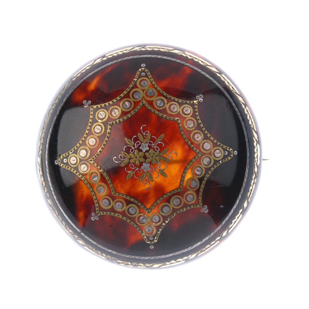 A late 19th century pique tortoiseshell brooch. (1 of 2)
