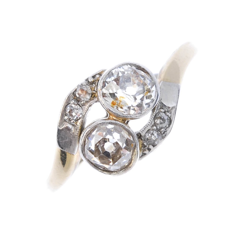 A mid 20th century diamond crossover ring. (1 of 4)